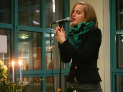 Kimbastian singing at a Candlelight concert