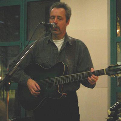 Hugh Featherstone singing at a Candlelight concert Hugh Featherstone singing at a Candlelight concert