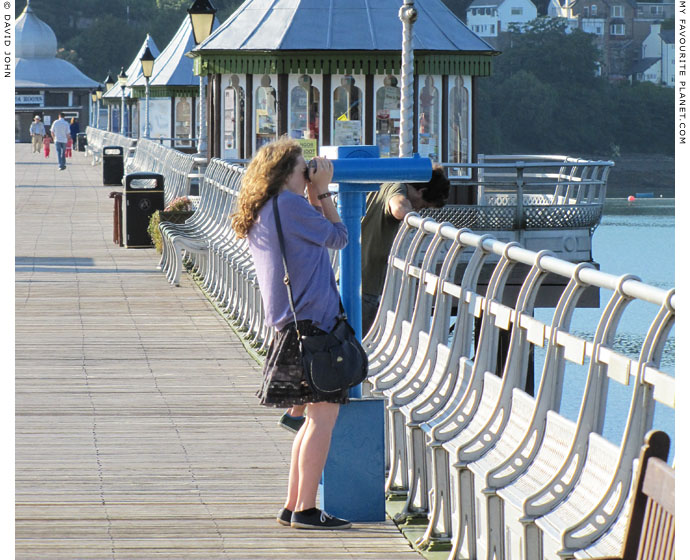 Owl Telescope user on Bangor Pier, North Wales at The Cheshire Cat Blog