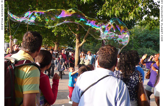 Giant bubbles on the The South Bank, London by Gordon Mcleod at the Cheshire Cat Blog