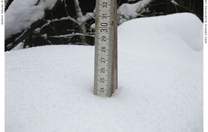 Measuring the depth of snow in Bernau by Peter Hinze at The Cheshire Cat Blog Measuring the depth of snow in Bernau by Peter Hinze at The Cheshire Cat Blog