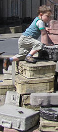 Young boy climbng over the sculpture "A Case History" by John King, Hope Street, Liverpool at The Cheshire Cat Blog