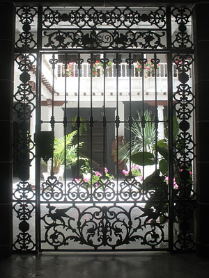 Courtyard in the main town of Isla Afortunada at The Cheshire Cat Blog