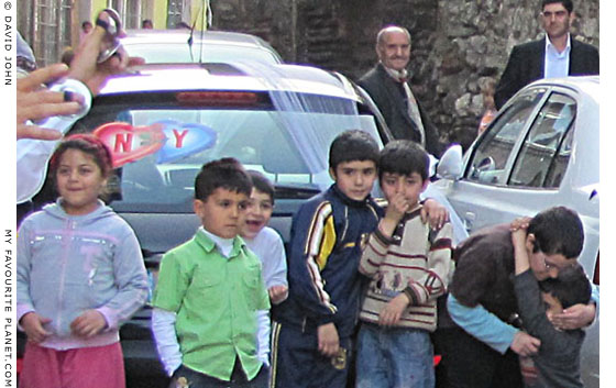 Children watching Köçek dancers in Istanbul at The Cheshire Cat Blog