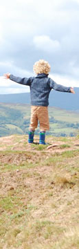 Noah on top of Skirrid Fawr, South Wales at The Cheshire Cat Blog