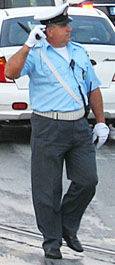 Policeman conducting traffic near Syntagma Square, Athens, Greece at The Cheshire Cat Blog