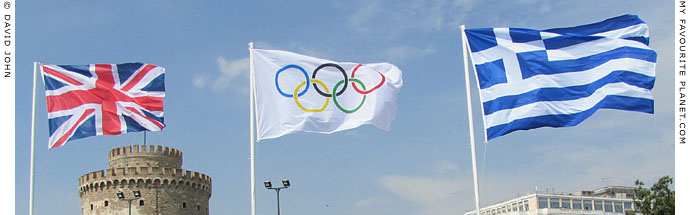 The flags of the United Kingdom, the Olympic Games and Greece flying in Thesaloniki, Macedonia, at The Cheshire Cat Blog