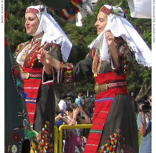 Young female Macedonian dancers performig a traditional Greek dance in Thessaloniki, Greece, at The Cheshire Cat Blog
