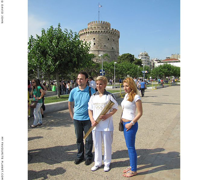 Greek Olympic torchbearer Giota Oikonomou and friends pose for fans at the end of the Olympic flame ceremony, Thessaloniki, Greece, at The Cheshire Cat Blog