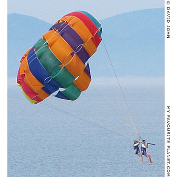 Parasailing couple, the coast of the Dilek Peninsula, Turkey