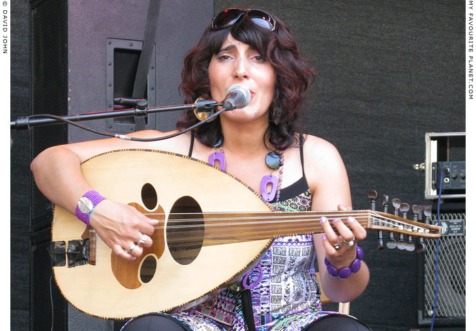 Sumeja Hiltmann of Sumeya Duo plays the oud at Weltfest am Boxhagener Platz, Friedrichshain, Berlin, by The Cheshire Cat Blog Sumeja Hiltmann of Sumeya Duo plays the oud at Weltfest am Boxhagener Platz, Friedrichshain, Berlin, by The Cheshire Cat Blog