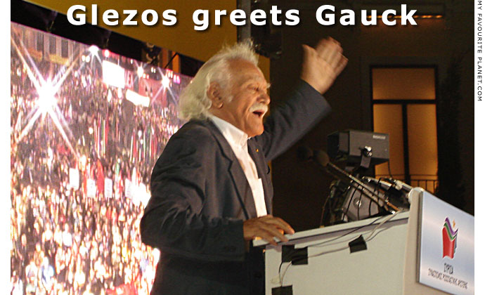 Glezos greets Gauck at The Cheshire Cat Blog