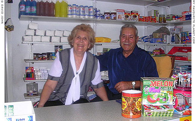 Mr and Mrs Xristodougos in their village shop in Vrasna, Macedonia, Greece at The Mysterious Edwin Drood's Column
