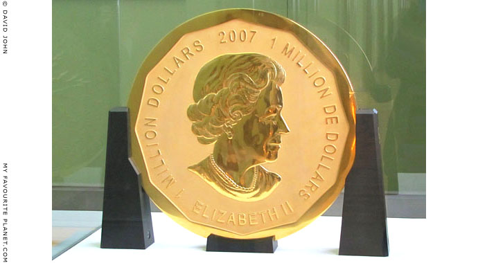 Queen Elizabeth the second's portrait on a million dollar gold coin, the largest gold coin in the world