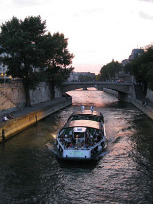 Tourist boat on the Seine at Pont au Double near Notre Dame, Paris at My Favourite Planet