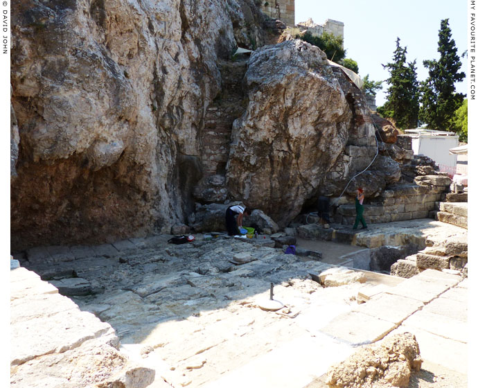 Greek archaeologists working at the paved court of the Klepsydra at My Favourite Planet