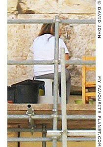 Restoration worker in the Erechtheion, the Acropolis, Athens, Greece at My Favourite Planet Restoration worker in the Erechtheion, the Acropolis, Athens, Greece at My Favourite Planet
