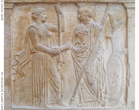 Hera and Athena shake hands Hera and Athena shake hands