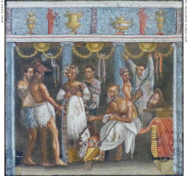 A choregos distributing masks to his to his actors on a mosaic from Pompeii at My Favourite Planet