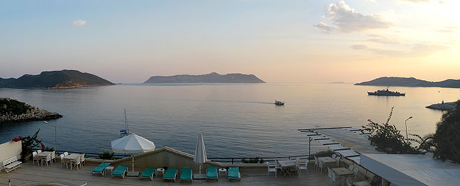 Panoramic view of the north coast of Kastellorizo island, Greece at sunset from Kas in Turkey at My Favourite Planet Panoramic view of the north coast of Kastellorizo island, Greece at sunset from Kas in Turkey at My Favourite Planet