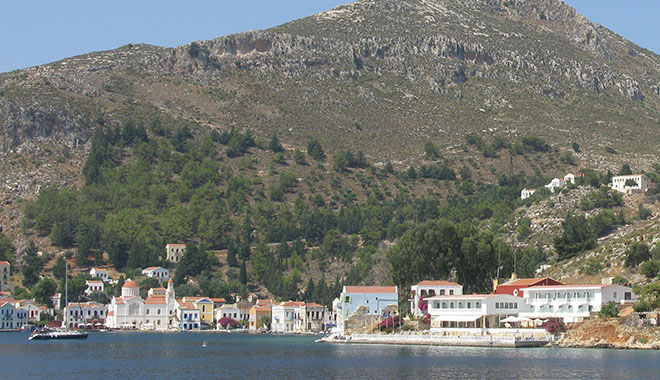 West side of the main harbour, beneath Mount Vigla, Kastellorizo, Greece at My Favourite Planet