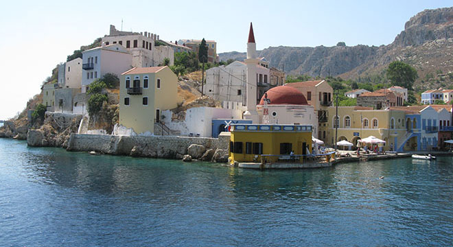 The northwest tip of the Kavos headland, Kastellorizo harbour, Greece at My Favourite Planet