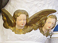 Cherubs with gilded wings on the pulpit of Agios Giorgos Tou Pigadiou church, Kastellorizo, Greece at My Favourite Planet