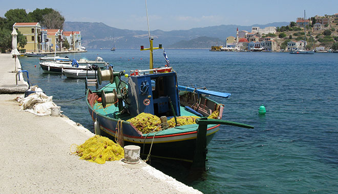 Fishing boats on the west side of Kastellorizo harbour, Greece at My Favourite Planet