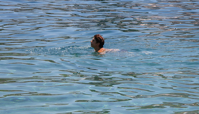 A swimmer in Kastellorizo harbour, Greece at My Favourite Planet