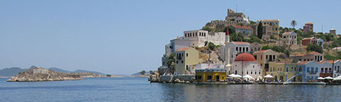 The Kavos headland and Psoradia from the west side of Kastellorizo harbour, Greece at My Favourite Planet