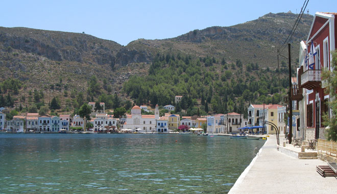 The view along the promenade on the west side of Kastellorizo harbour, Greece at My Favourite Planet