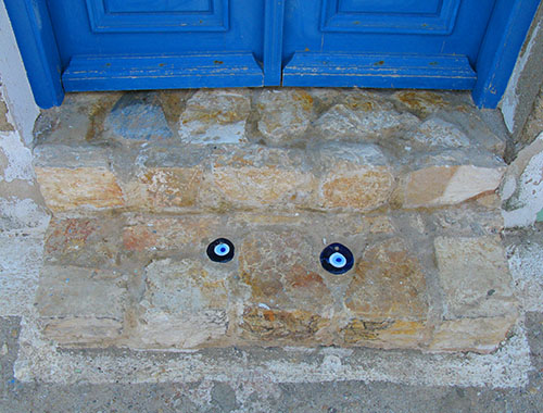 kali matia (good eyes) on a house doorstep, Kastellorizo, Greece at My Favourite Planet
