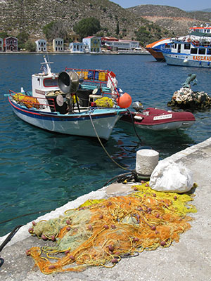 Fishing boat on the east side of Kastellorizo harbour, Greece at My Favourite Planet