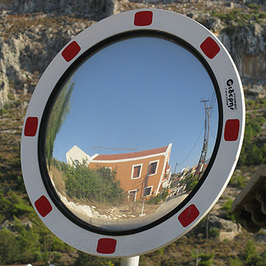 Convex traffic mirror on the way to the Knights' Castle, Kastellorizo, Greece at My Favourite Planet