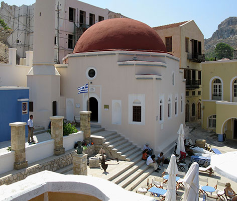 The Ottoman mosque and Nikolaou Savva Square, Kastellorizo, Greece at My Favourite Planet