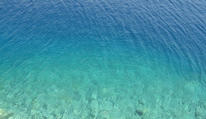 The crystal clear seawater in Kastellorizo harbour, Greece at My Favourite Planet