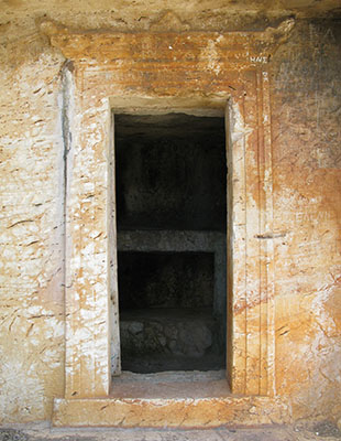 The doorway of the Lycian rock-cut tomb (4th century BC), Kastellorizo, Greece at My Favourite Planet