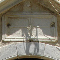 The stone plaque above the arched doorway to the Konaki fortress and Archaeological Museum, Kastellorizo, Greece at My Favourite Planet