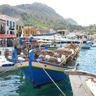 Fishing boat on the east side of Kastellorizo harbour, Greece at My Favourite Planet