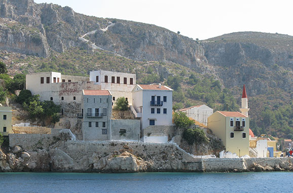 Houses on the Kavos headland, at the east side of the main harbour of Kastellorizo, Greece at My Favourite Planet