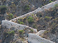 The stone stairway up the cliff above Kastellorizo harbour, Greece at My Favourite Planet