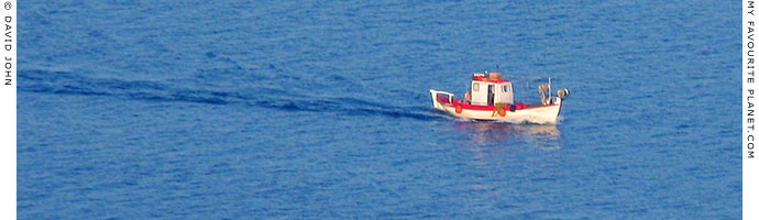 A fishing boat in the Bay of Kavala at My Favourite Planet