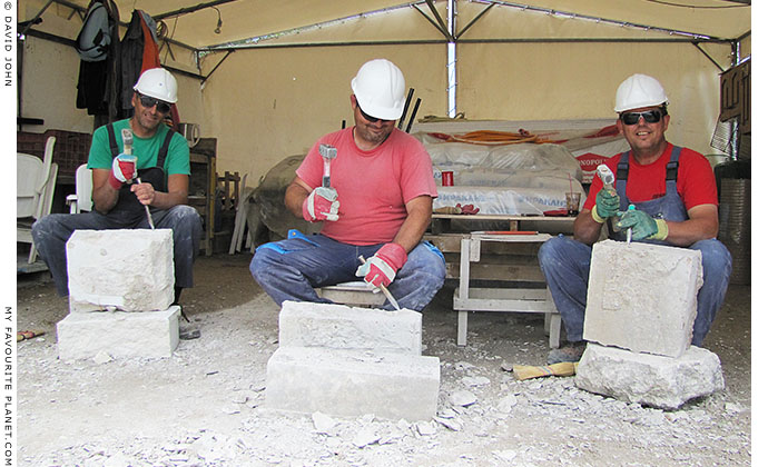 Stonemasons working during the restoration of the agora of Pella Archaeological Site, Macedonia, Greece at My Favourite Planet