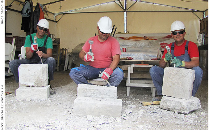 Stonemasons working during the restoration of the agora of Pella Archaeological Site, Macedonia, Macedonia, Greece at My Favourite Planet Stonemasons working during the restoration of the agora of Pella Archaeological Site, Macedonia, Greece at My Favourite Planet