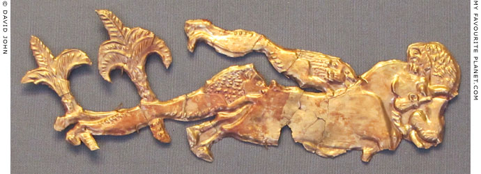 Mycenaean gold cut-out depicting two lions attacking a bull at My Favourite Planet