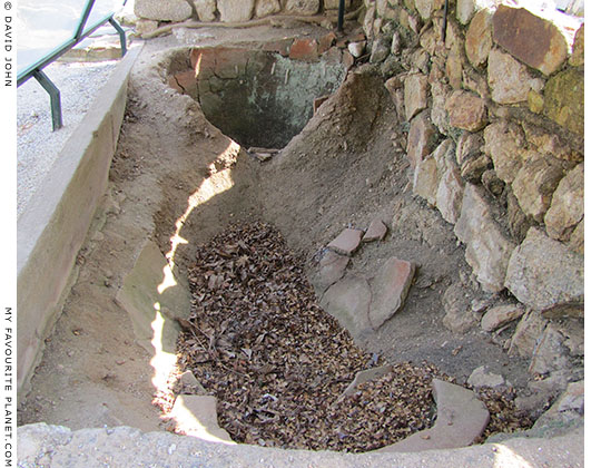 The bases of large ceramic storage jars set into the earth. The bases of large ceramic storage jars set into the earth.