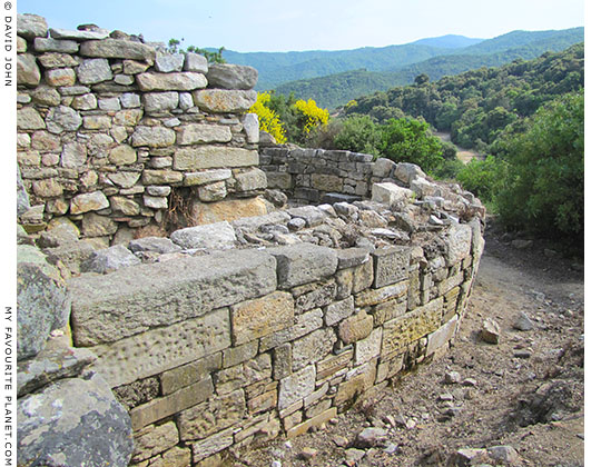 The north side of the Hellenistic building and the Middle-Byzantine tower built inside it. The north side of the Hellenistic building and the Middle-Byzantine tower built inside it.