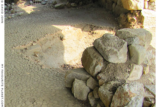 The rectangular space in the mosaic floor thought to have been occupied by an Archaic altar. The rectangular space in the mosaic floor thought to have been occupied by an Archaic altar.