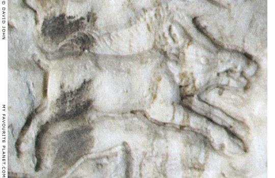 Marble relief of a wild boar