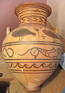 Ancient Greek ceramic funerary urn decorated with birds and hunting dogs, from Macedonia, Greece